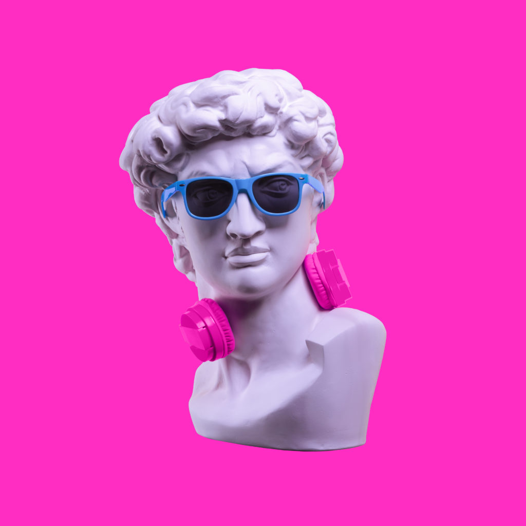 Statue wearing headphones and sunglasses
