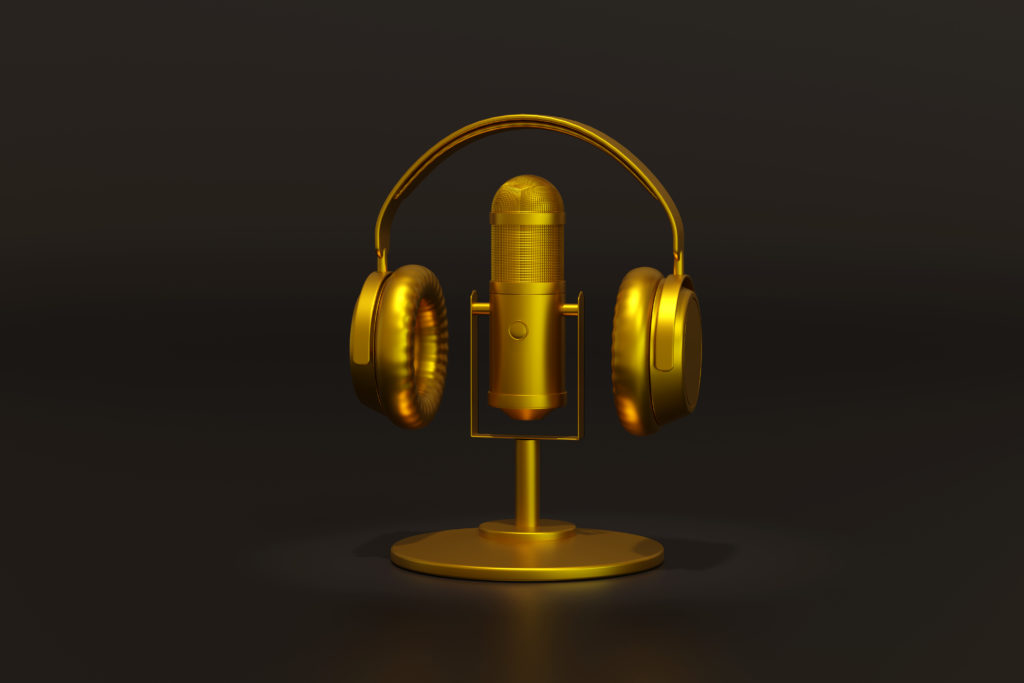 gold headphones and mic