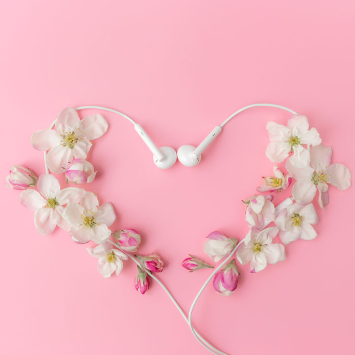 headphones in a heart with flowers