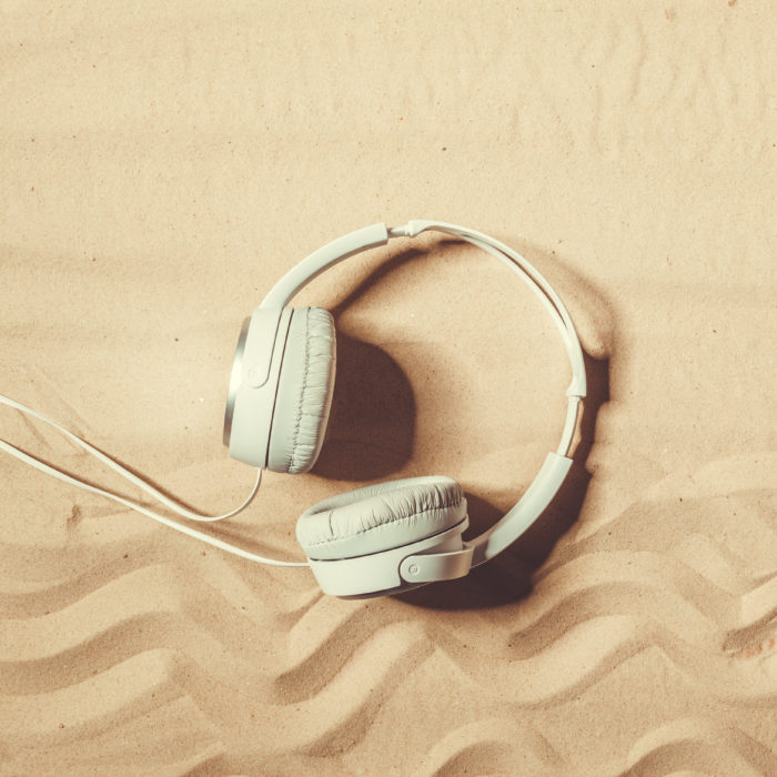 headphones in the sand