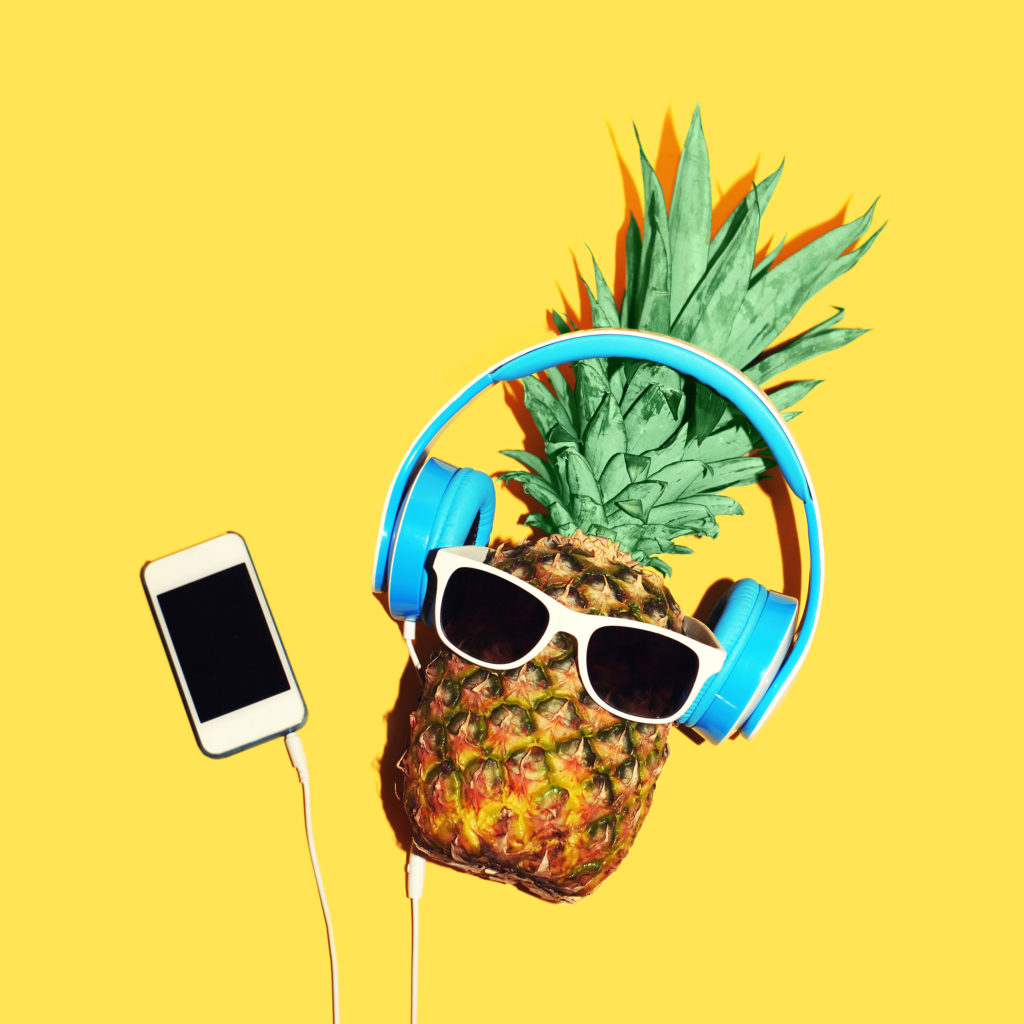 pineapple with sunglasses and headphones