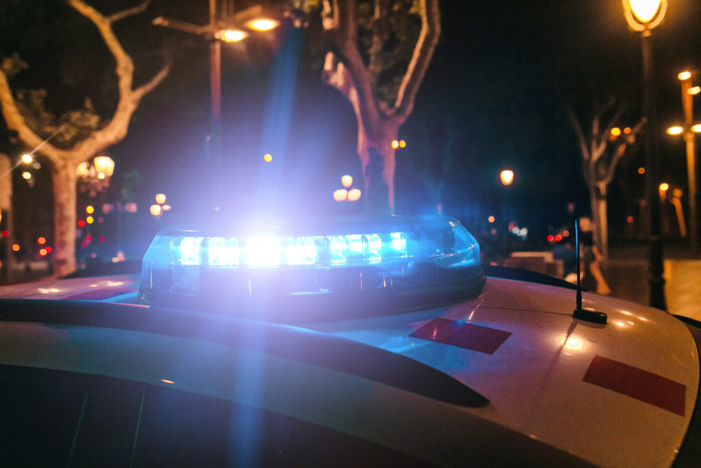 Police car with flashing lights